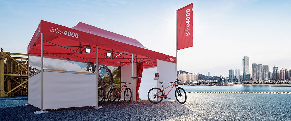 A Pro-Tent promotion tent being used by Bike4000 for product advertising in a city.