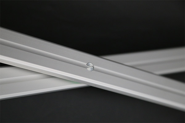 Close-up view of the robust articulated frame on a Pro-Tent folding tent. 