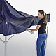 A windproof folding pavilion from Pro-Tent is quickly erected by two people.