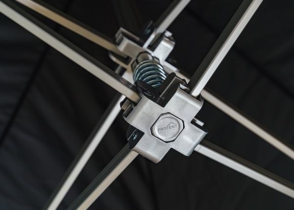 Close-up of the telescopic spring in the roof frame of a Pro-Tent folding tent