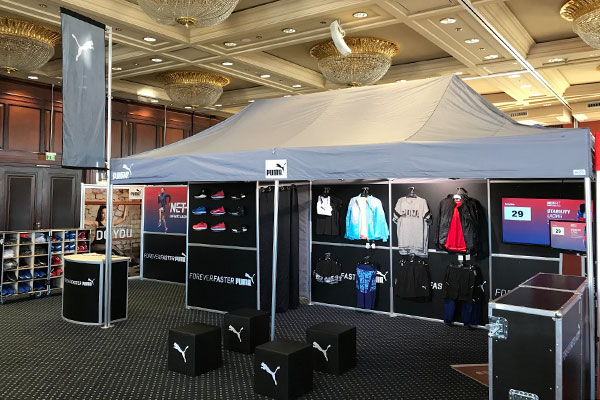 A booth of the sporting goods manufacturer Puma.
