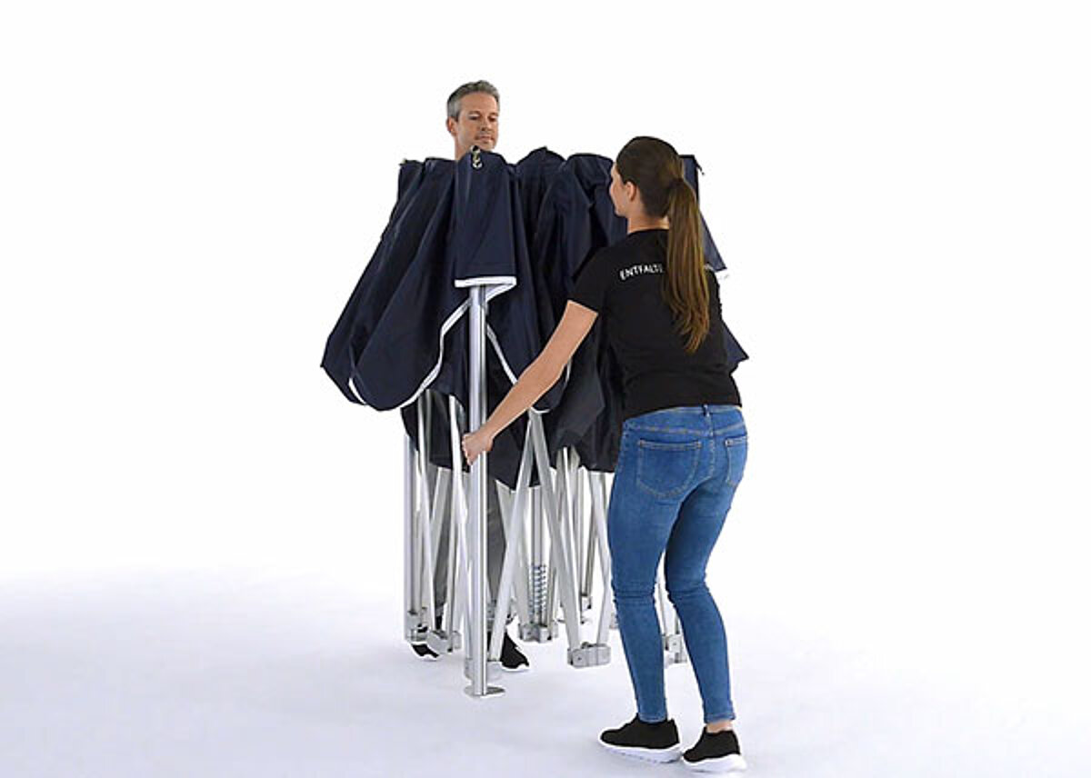 The folding tent is unfolded.