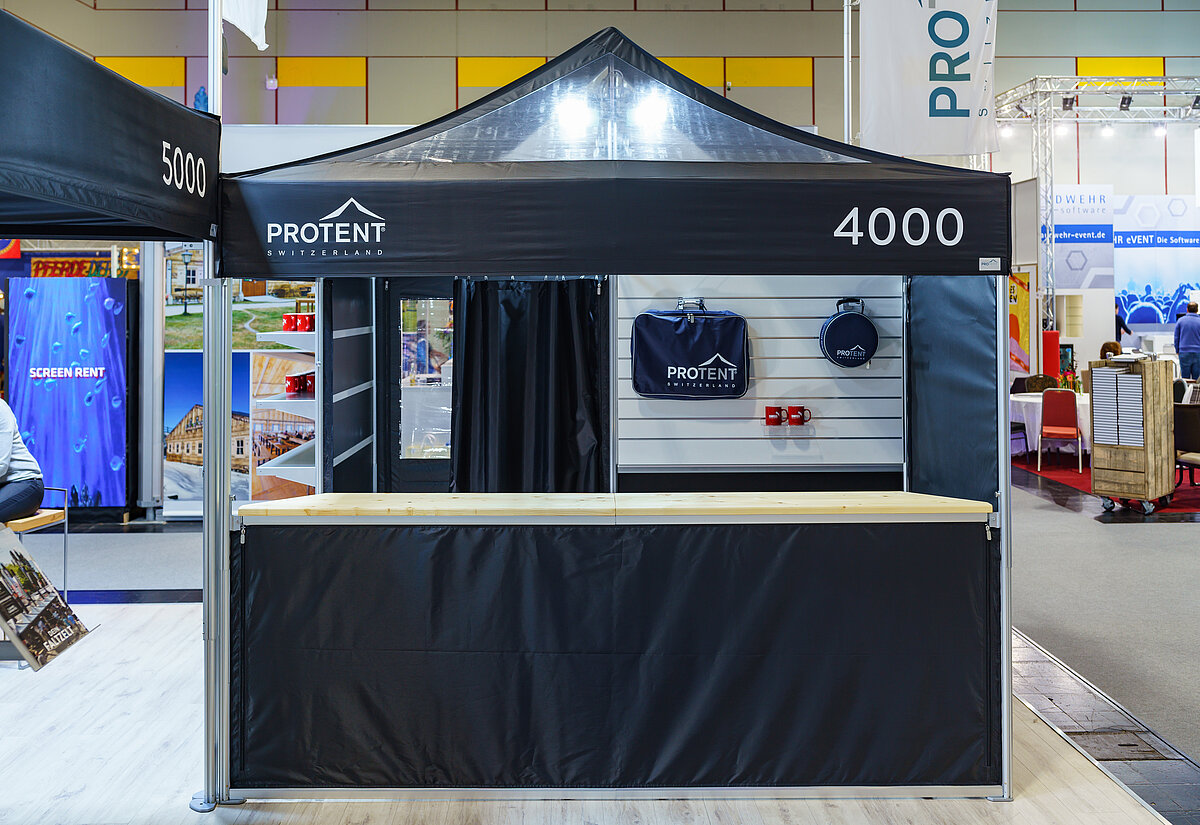A Pro-Tent folding tent at a trade fair.