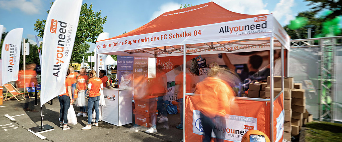 A promotional tent of the Allyouneed supermarket.