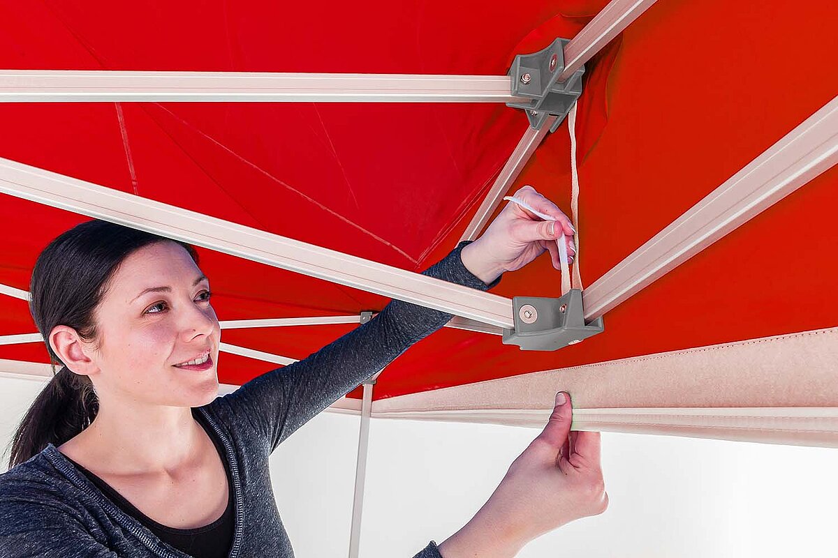 A Pro-Tent tent roof is tightened with velcro straps.