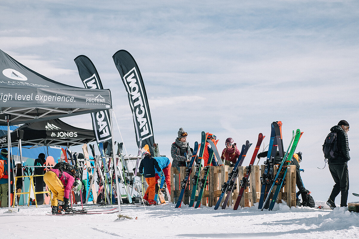 Pro-Tent folding tents are unbeatable when it comes to outdoor use. Skiers stand in front of Pro-Tent folding tents.