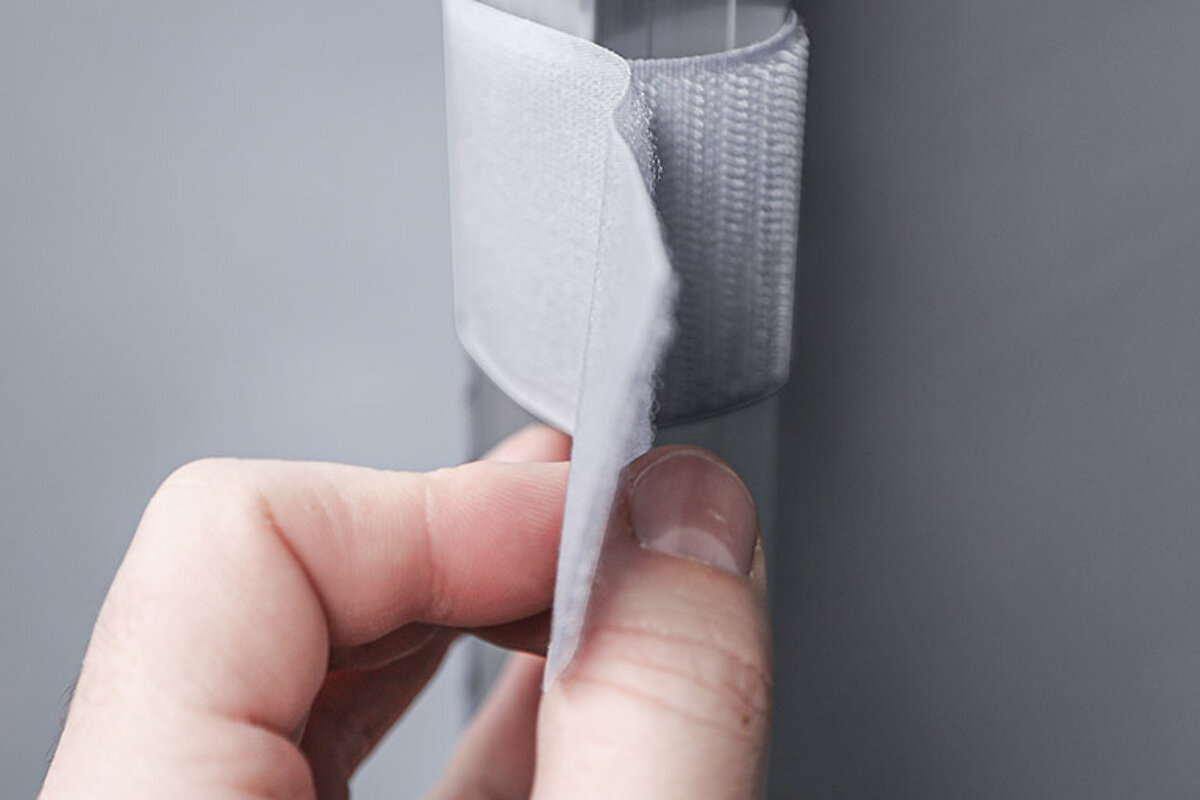 A close-up of the Velcro loops for attaching the side panels.