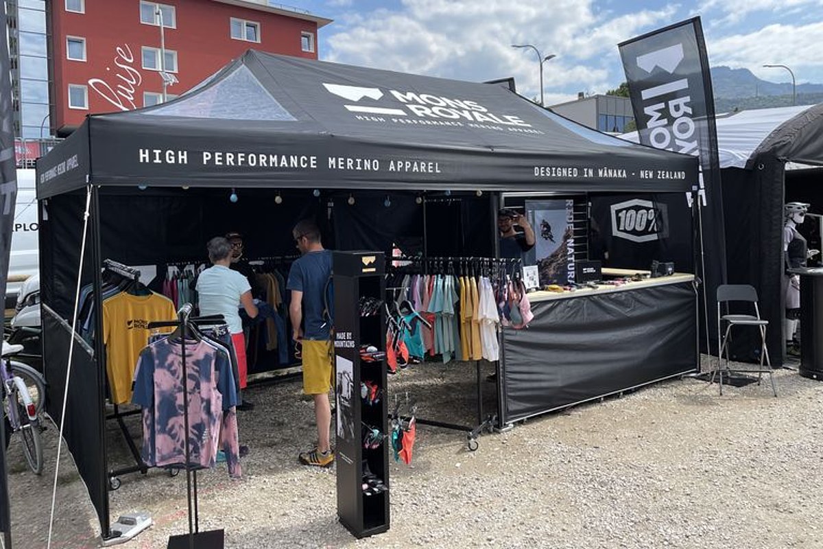 A Pro-Tent folding tent being used as a display area for sportswear.