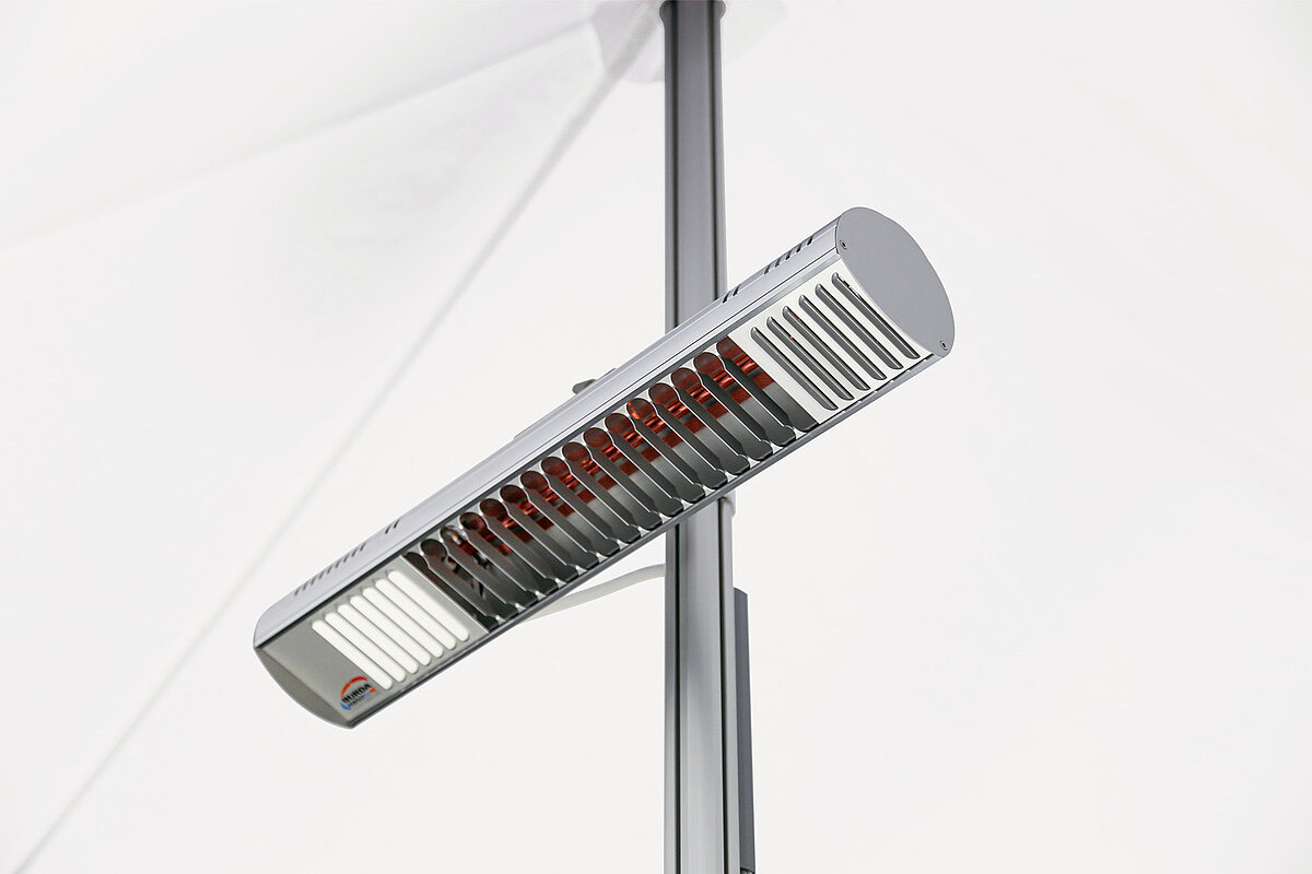 An infrared radiant heater attached to the folding tent frame of a Pro-Tent folding tent.