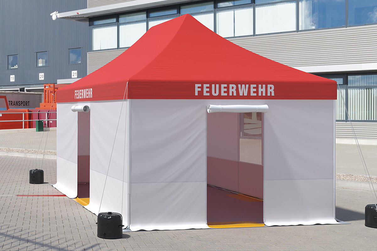 A Pro-Tent fire tent with water weights, side walls and other accessories.